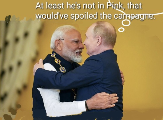 Putin und Mohdi umarmen sich, in Gedankenblase: wenigstens ist er nicht in Rosa gekommen, das hätte die Kampagne verdorben.