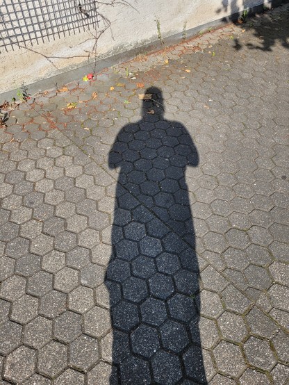 Mein Schatten auf Betonsteine.